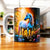 Mug Licorne : licorne bleue luminescente dans une prairie fleurie ensoleillée