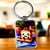 Porte-clé Brioche : porte-clé argenté rectangulaire avec image imprimée mignonne de tranche de pain souriante aux baies et nœud papillon