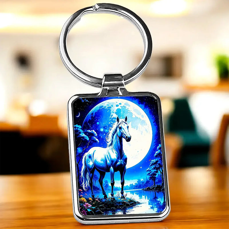 Porte-clé Cheval Blanc : cheval blanc devant lune, reflets dans l’eau