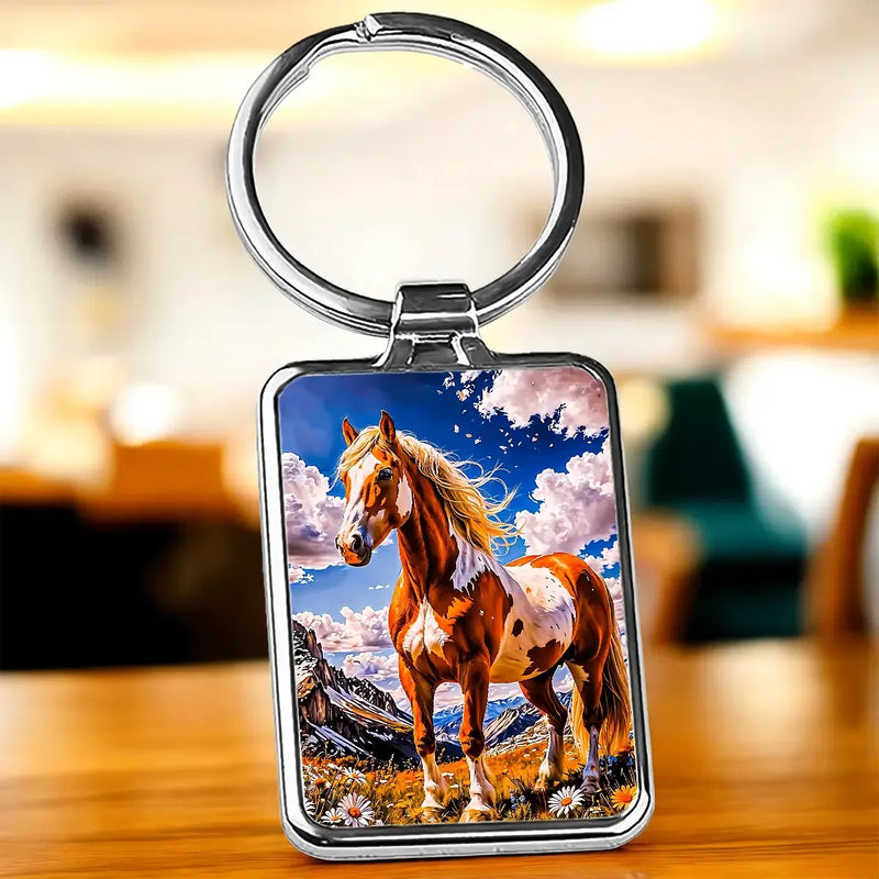 Porte-clé Cheval Majestueux : cheval brun et blanc en champ montagneux