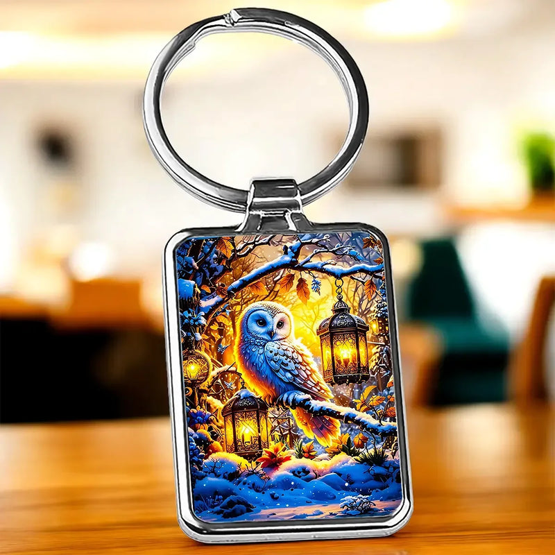 Porte-clé Chouette : hibou sur branches enneigées et lanternes