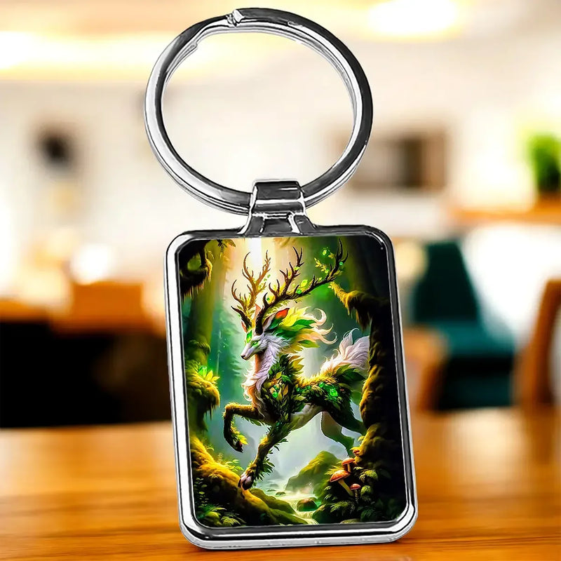 Porte-clé Esprit de la Forêt : cerf vert dans forêt mousseuse, cadre argenté