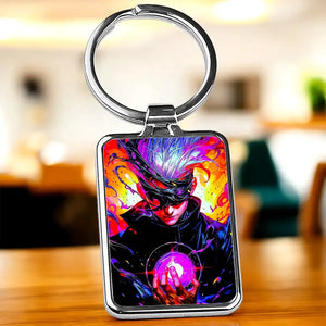 Porte-clé Gojo rectangulaire en métal avec illustration colorée de personnage masqué et effets énergétiques violets et oranges dynamiques