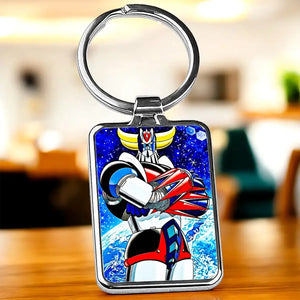 Porte-clé Goldorak chrome avec Mazinger Z sur fond étoilé bleu