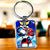 Porte-clé Goldorak chrome avec Mazinger Z sur fond étoilé bleu
