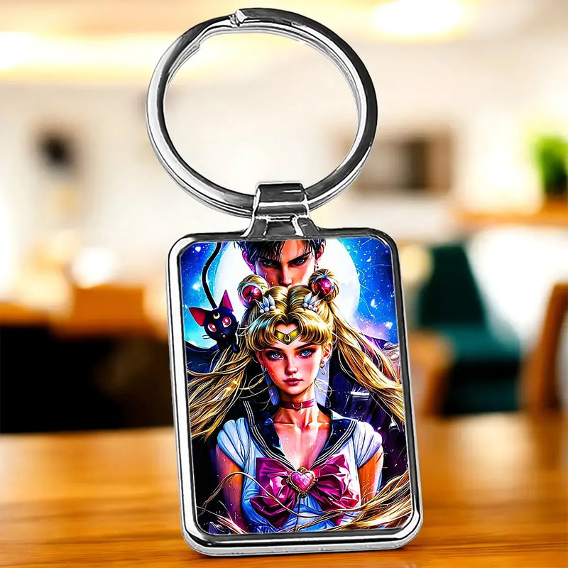 Porte-clé Sailor Moon rectangulaire en métal avec Sailor Moon et Tuxedo Mask sous ciel étoilé