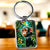 Porte-clé argenté rectangulaire singe jungle luxuriante