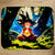 Tapis de souris Goku enfant : Goku jeune assis sous arbres avec boule de dragon
